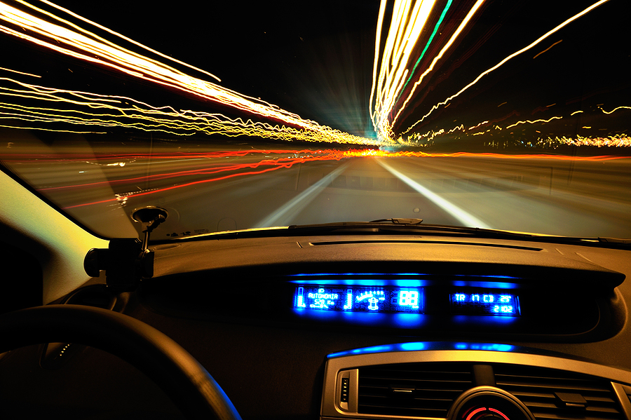 Vehicle Traveling On A Metro Detroit Road At Night