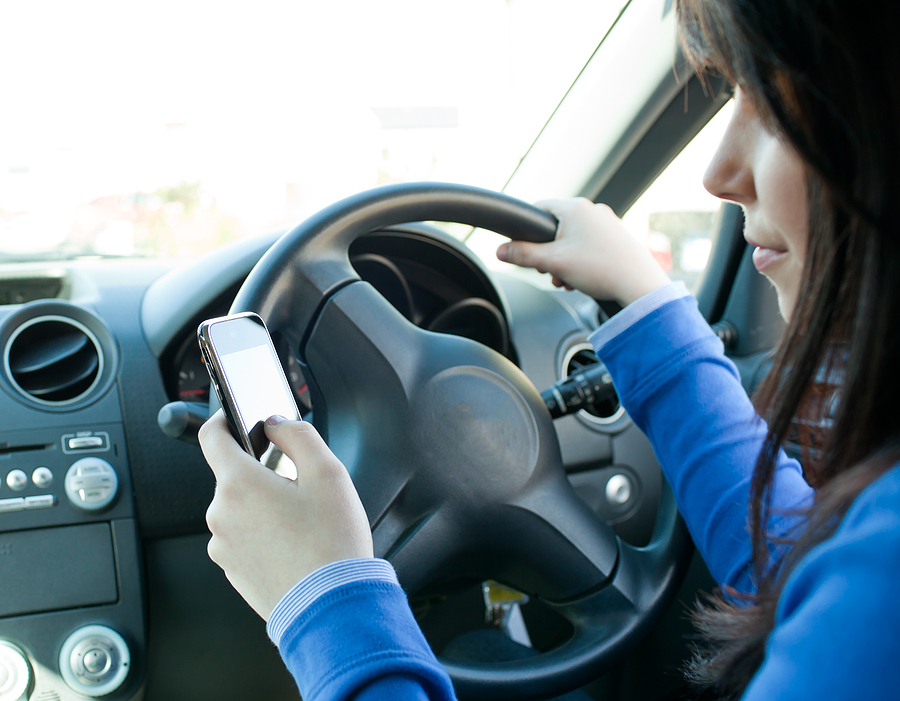 Driver Using Cell Phone While Driving In Michigan